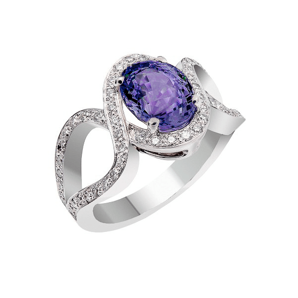 Bague en or blanc 18 carats avec saphir ovale et monture en volutes sertie de diamants, vue de face