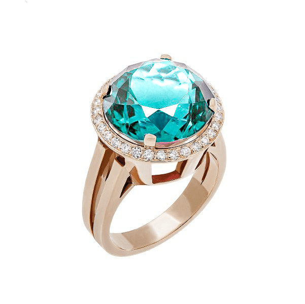 Bague en or rose 18 carats surmontée d’une topaze bleue électrique ronde entourée de diamants, vue de face