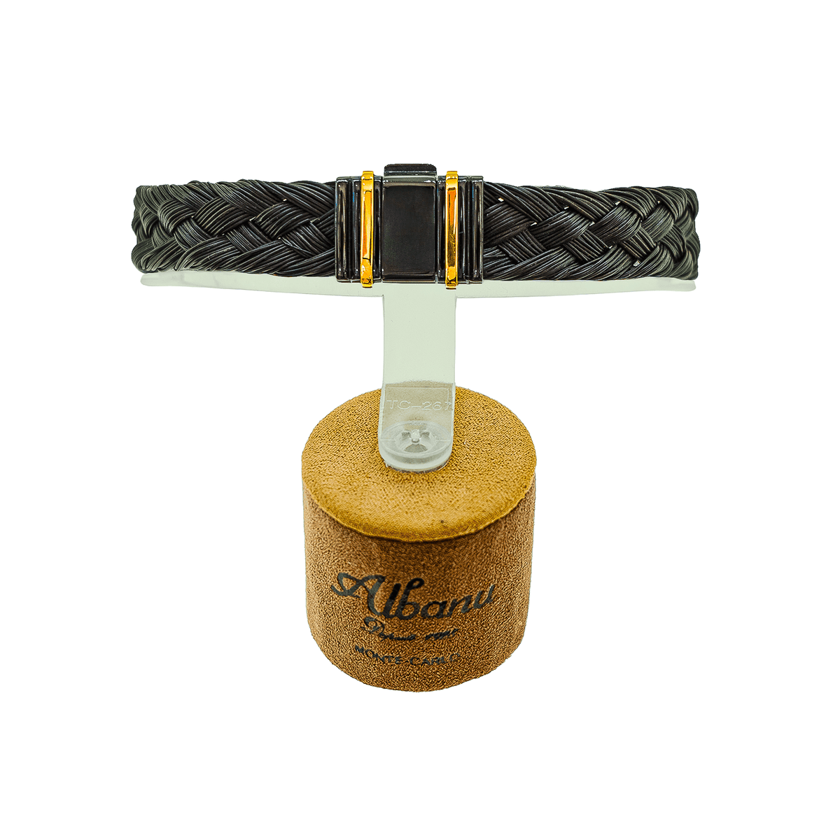 Bracelet Albanu en poil de girafe tressé, acier noir et or jaune 18 carats sur un fond blanc