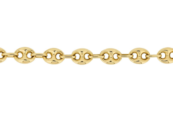 Chaine maille grain de café creuse en or or jaune 18 carats sur un fond blanc