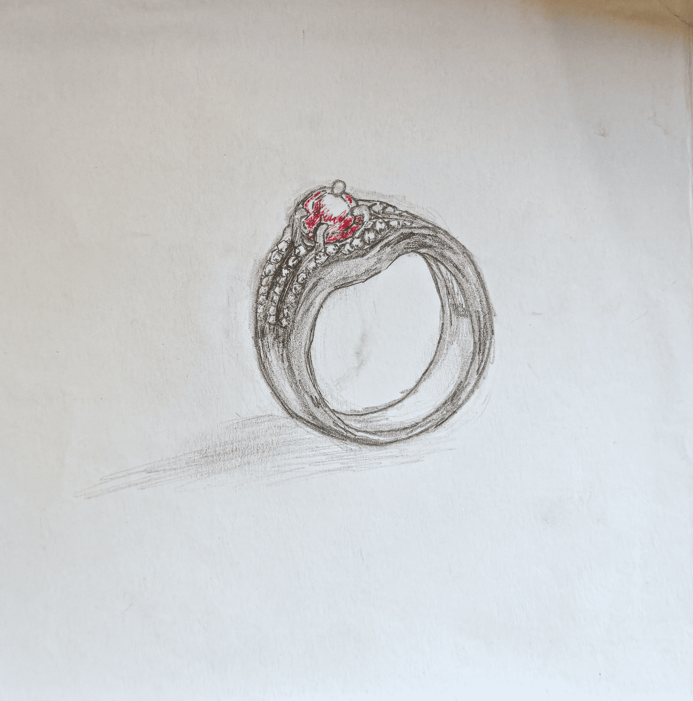 Dessin bague en or blanc sertie d'un rubis et de diamants.