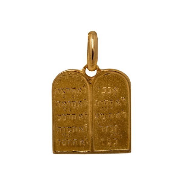 Pendentif table de la loir verso en or sur un fond blanc